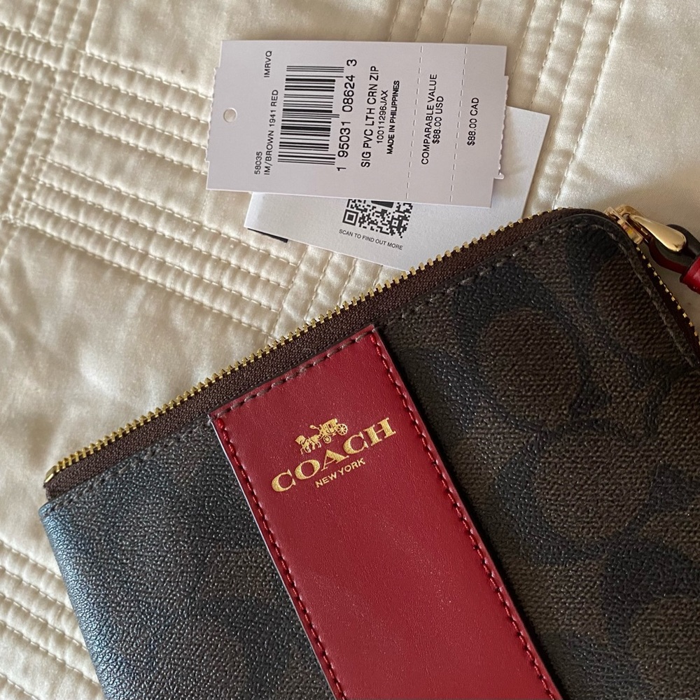 Coach brown and red wrist wallet